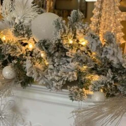 King Of Christmas 9' X 12" King Flock® Garland With LED Lights (Battery Operated) -Christmas Decoration Shop 48d1558c53c55869466c3c2f4bc12cef