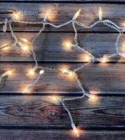 3x150 Warm White Icicle Lights -Christmas Decoration Shop A1WCXjtT22L. AC SL1500 1 600x674 1
