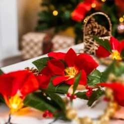 Pre Lit Velvet Silk Poinsettia Garland With Red Berries 6ft 13 Pre Lit Velvet Silk Poinsettia Garland With Red Berries 6ft -Christmas Decoration Shop Pre Lit Velvet Silk Poinsettia Garland with Red Berries 6ft 6 result 600x600 1