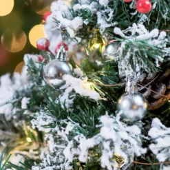 50 LED Prelit Tabletop Christmas Tree With String Lights 24in -Christmas Decoration Shop Prelit Tabletop Flocked Christmas Tree with 50 Warm White String Lights 24in 8 result 600x600 1