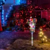 Tall Christmas Lighted Santa Claus With Merry Christmas Sign 25in 2 Tall Christmas Lighted Santa Claus With Merry Christmas Sign 25in -Christmas Decoration Shop Tall Christmas Lighted Santa Claus with Merry Christmas Sign 25in 1 result 600x600 1
